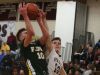 New Paltz's Charlie Perez (10) tries to block Franklin D. Roosevelt's Ethan Hart (10) layup during basketball game at New Paltz High School on Feb. 3, 2017.
