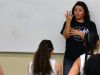 Translator Francine Aguilar relays the game plan to sisters Valerie and Mireya Phlaum during a recent Shadow Hills girls' basketball practice.