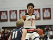 New Albany's Romeo Langford (1) brings the ball upcourt against Providence's Sam Conrad (11) on Friday at New Albany High School. New Albany won 55-40.