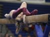 Sioux Falls Roosevelt's Kami Lensegrav performs on the beam Friday at the Class AA State Gymnastics Meet at the Golden Eagles Arena.