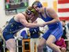 DeWitt’s Douglas Trutzl, left, and Bath’s Drew Goeddeke grapple in the 215 weight class at the D2 District tournament held at DeWitt Saturday, February 11, 2017.