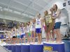 The Carmel Girls Swim Team is presented a trophy for winning the IHSAA girls swimming state finals, held at IUPUI Natatorium, Feb. 11, 2017.