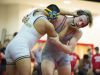 Sussex Central's Mario Santizo, left and Smyrna's Tony Wuest battles for position in the 220 pound match at DIAA Dual Meet Wrestling State Championship at Smyrna High School.