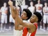 Hamilton Southeastern's Zach Gunn (42),left, fights for a rebound with Pike's Darian Porch (32) in the first half of their game Tuesday, February 14, 2017, evening at Hamilton Southeastern High School