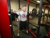 Senior Jared Lund does squats in North Salem High School's newly remodeled weight room on Tuesday, Feb. 14, 2017. The facility includes new rubber floors, eight new weight lifting racks, four new spin bikes and new free weights.