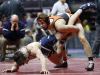 Valley's Grant Stotts looks up at the time as he wrestles Cedar Rapids Xavier's Josh Gerke in their 145 pound match Thursday, Feb. 16, 2017 during the class 3A opening round at the 2017 State Wresting Tournament at Wells Fargo Arena in Des Moines.