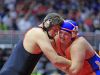 Elijah Van't Hof of Sioux Center wrestles Tyler LinderBaum of Solon at 285 Lbs. Thursday, Feb. 16, 2017.