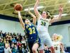 Sydnee Dennis ,30, of Haslett winds up to block a shot attempt by Jessah McManus of DeWitt during their game Friday February 17, 2017 in Haslett.
