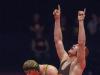 FILE – Mason Parris (in orange and black), defeats Gunnar Larson of Avon at the 2016 IHSAA wrestling state finals at Bankers Life Fieldhouse.