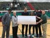 Former Tech star and 2014 IndyStar Trey Lyles (center) donates $20,000 to the school.