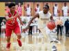 Warren Central's Dean Tate drives against Pike's Ditwin Gary.