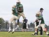 McKay's Jamer Silva (80) jumps up with teammate Cyrus Mora (5) to celebrate a touchdown in a game against Forest Grove on Friday, Sept. 16, 2016. The McKay Royal Scots won the game 43-0.