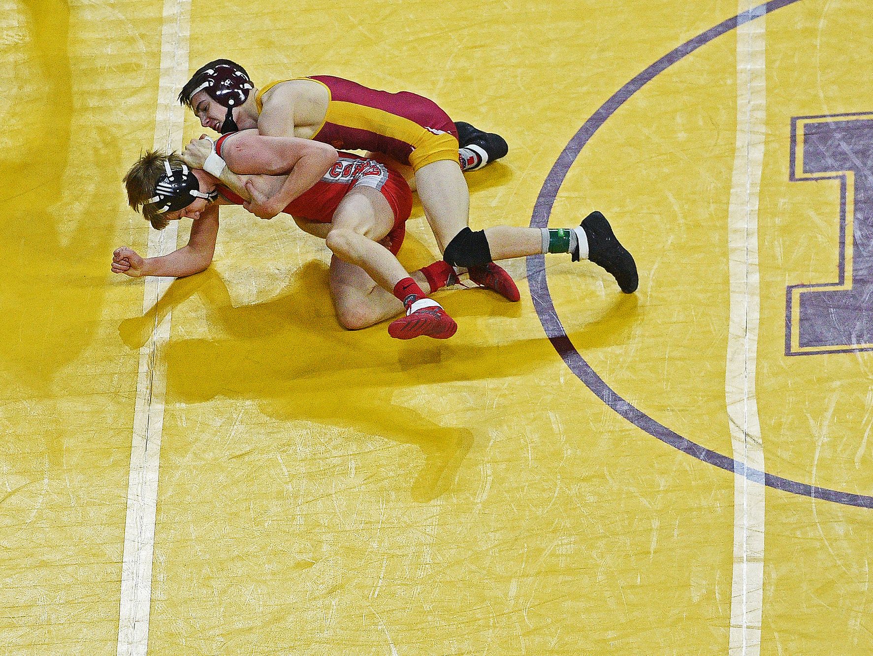 Roosevelt's Eli Kadoun, right, wrestles Rapid City Central's TJ Morrison in a Class A 113-pound quarterfinal match during the 2017 SDHSAA State Wrestling Championships Friday, Feb. 24, 2017, at the Denny Sanford Premier Center in Sioux Falls.