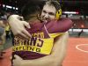 Luxemburg-Casco senior Phil Rasmussen hugs his coach George Jimenez after his 285-pound WIAA Division 2 semifinal win at the WIAA individual state wrestling tournament.