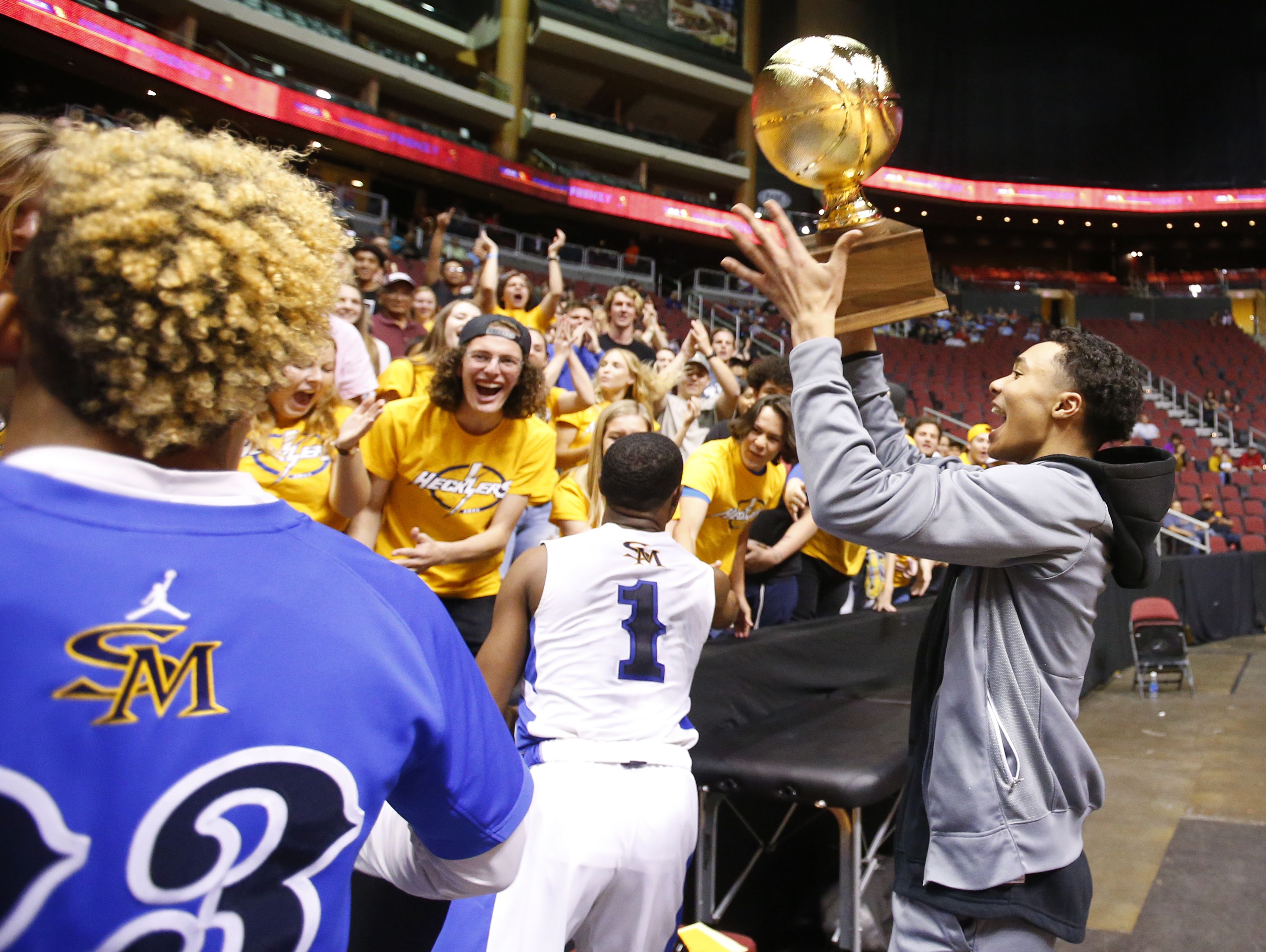 Shadow Mountain Jaelen House (2) celebrated winning the high school boys basketball: 4A Conference state championship game Salpointe at Gila River Arena in Glendale on February 25, 2017. House was ejected from the game during a skirmish with Salpointe Isaac Cruz (3)and was not allowed on the court to celebrate with his team.