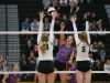 Johnston's Taryn Knuth hits the ball over the net during the Class 5A regional final between Ankeny Centennial and Johnston on Monday, Oct. 31, 2016.
