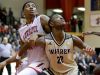 Lawrence North Wildcats Kevin Easley (34) and Warren Central Warriors Jakobie Robinson (23) fight for position under the basket in the second half of their game Tuesday, February 28, 2017, evening at North Central High School. The Lawrence North Wildcats defeated the Warren Central Warriors 60-54.
