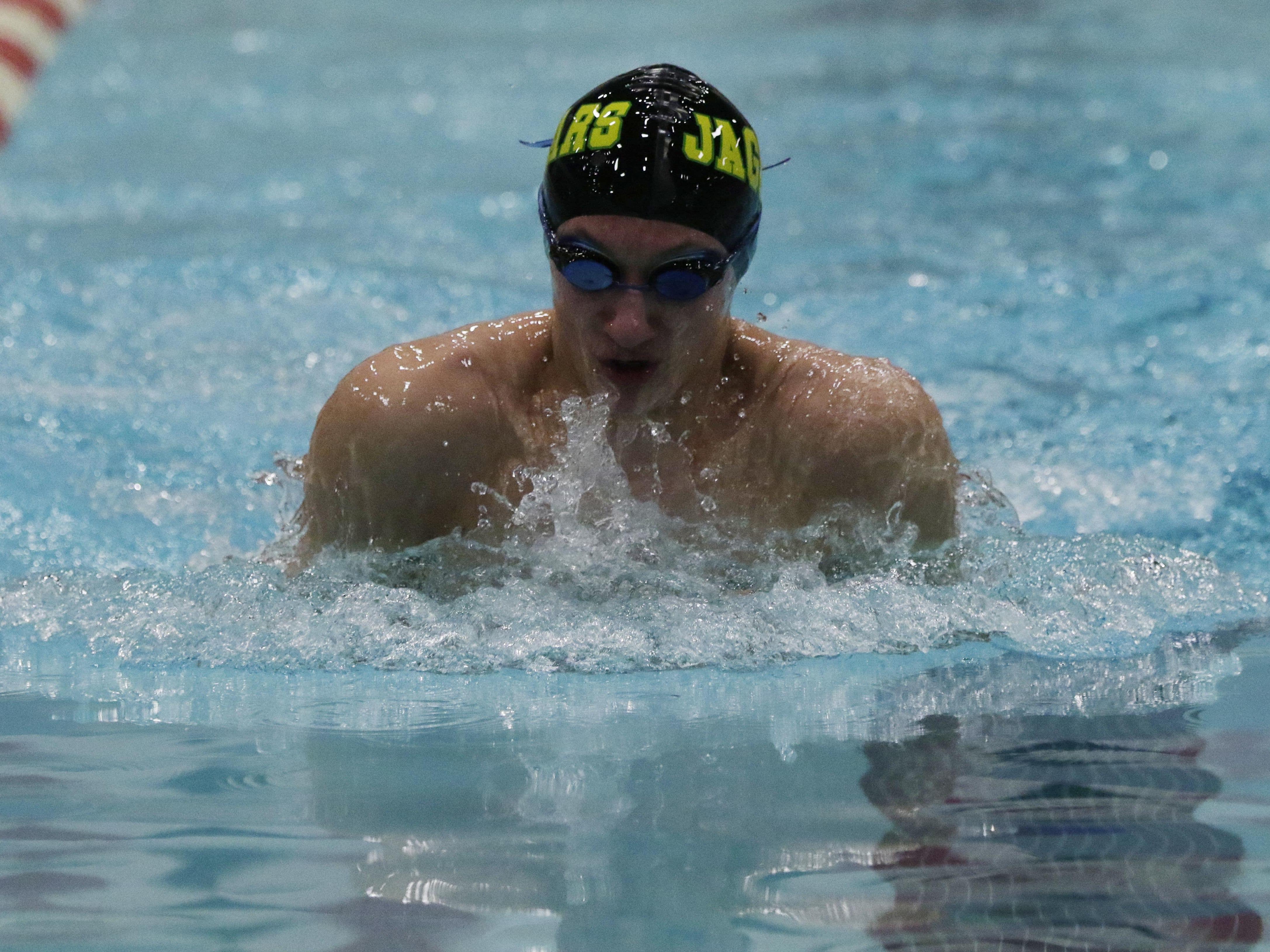 Ashwaubenon senior Daniel Jablonski swims the 100-yard breaststroke during the WIAA Division 2 state boys swimming and diving championships held at the University of Wisconsin Natatorium on Friday. Jablonski placed fifth to help the Jaguars finished as the D2 state runners-up.