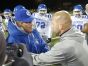 Novi Catholic Central head coach Tom Mach, left, and Northville high school head coach Matt Ladach shake hands after CC's 35-14 win in their football playoff game in Northville on Friday, November 1, 2013. Julian H. Gonzalez /Detroit Free Press