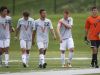 Valley soccer players Aaron Williams, 20, Britton Hiskey, 17, Addison Parrish, 22, Jordan Lucas, 7, and AJ Thompson, 00, walk off the field together during a varsity boys soccer match between West Des Moines Valley and Sioux City West on Saturday, May 10, 2014, at Valley Stadium in West Des Moines, Iowa.