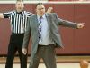 Franklin County Lady Flyers head basketball coach Joey Thacker points to his bench as he encourages his team to huddle quickly in the closing minutes of the game. Butler won the contest, 54-47. 30 January 2015