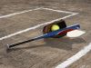 Softball, softball glove and bat at home plate