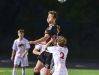 Ankeny Centennial's Jake Pinegar (10) heads the ball as Ankeny's Jack Nurre (2) defends on Thursday, May 5, 2016, during the Ankeny and Ankeny Centennial Soccer Doubleheader to Kick Out Cancer.The games and funds raised through t-shirt sales and PK (penalty kick) shootout ticket sales will support local Ankeny organization Cops Against Cancer.