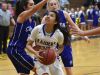 Reed's Larsa Guzman looks to shoot with Carson's Dajarrah Navarro covering her in the first half of Wednesday's playoff game at Reed.
