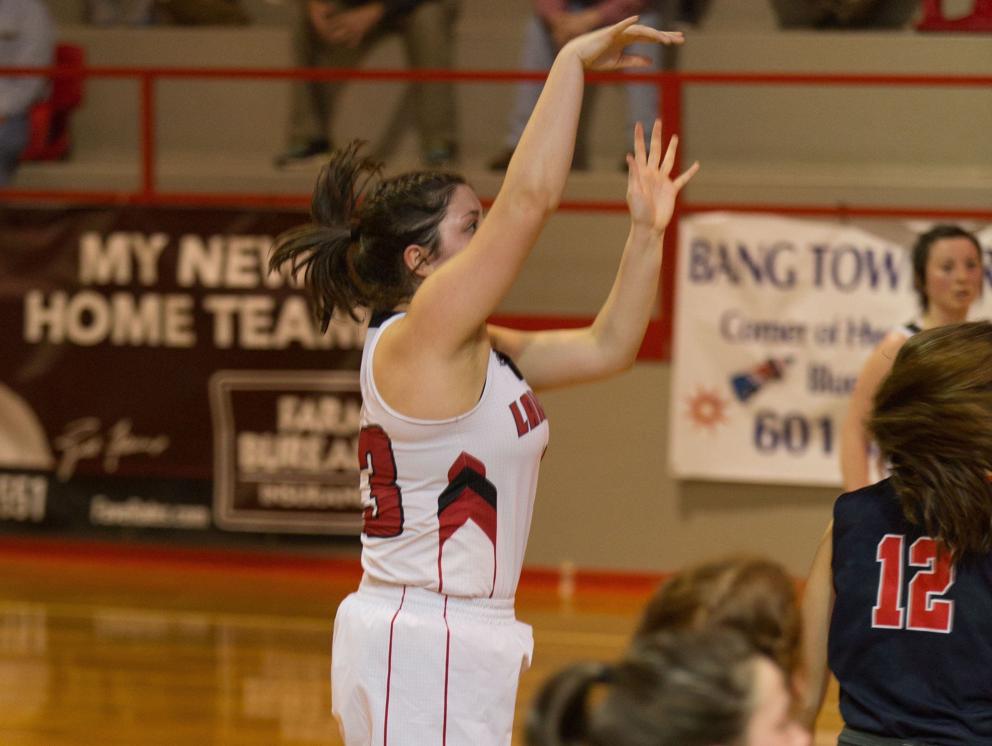 Jaylee Riggs shoots a free throw during an MAIS Class A state semifinal game on Friday.