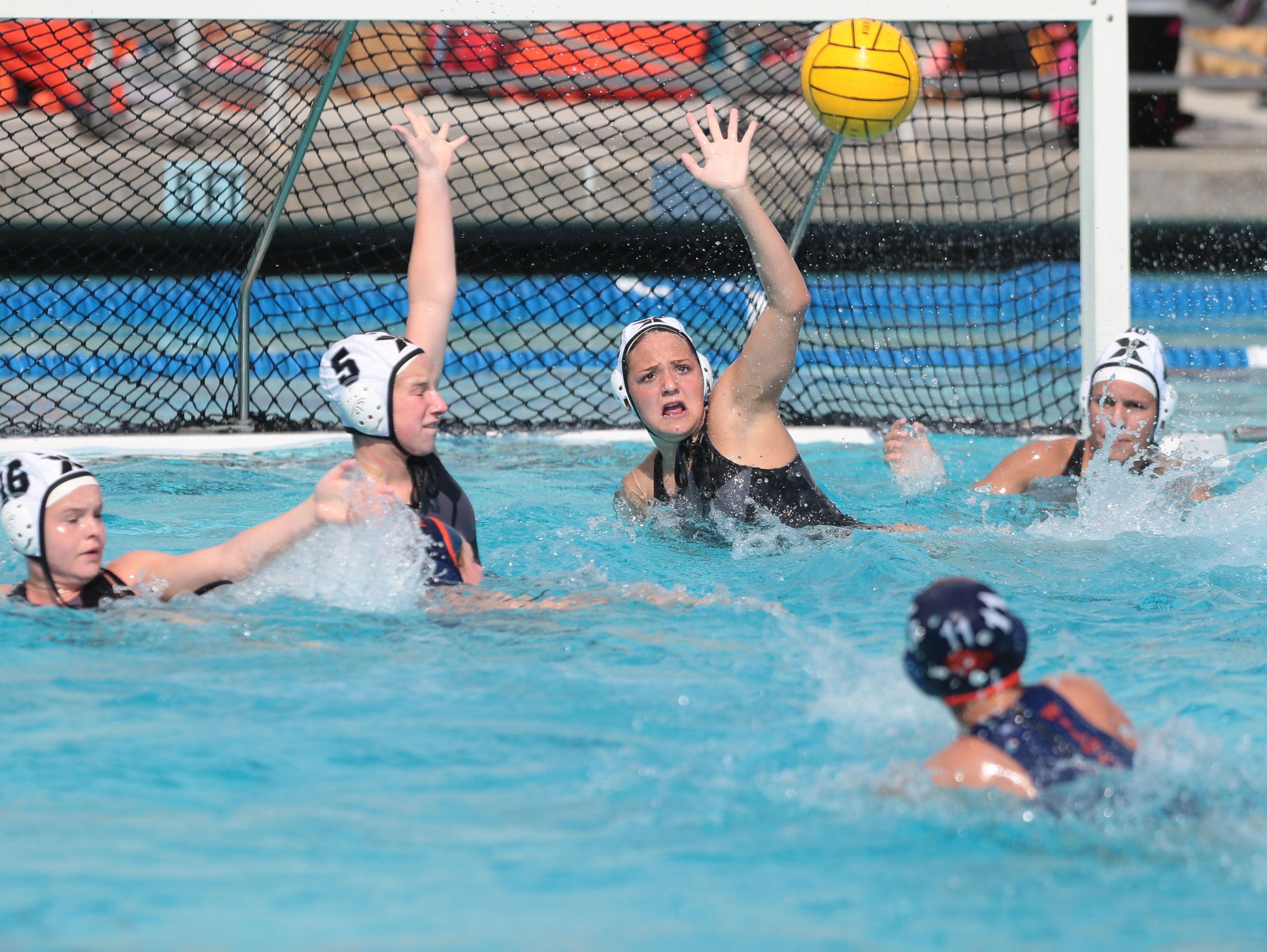 Xavier Preparatory Saints defend the net against the Polytechnic Panthers during the CIF Southern Section Division 5 finals in Irvine on Saturday, February 25, 2017.