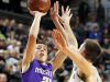 Muscatine's Joe Wieskamp shoots over West High's Connor McCaffery during their game at the U.S. Cellular Center in Cedar Rapids on Tuesday. Both are committed to play at Iowa in college.