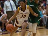 St. Elizabeth freshman Sha'Nia Davis drives against Archmere's Danaziah Brown in the fourth quarter. St. Elizabeth defeats Archmere 49-42 in the second round of the DIAA state girls basketball tournament at St. Elizabeth Thursday.
