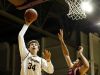 Kickapoo Chiefs senior Jared Ridder (34) shoots the ball over an Ozark Tigers defender during fourth quarter action of the MSHSAA Class 5 District 11 championship playoff game between the Kickapoo Chiefs and the Ozark Tigers at Hammons Student Center in Springfield, Mo. on March 2, 2017. The Kickapoo Chiefs won the game 52-41.