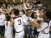 Caravel players celebrate with their fans following Caravel Academy's 66-56 win over Sanford School in the quarterfinals of the DIAA Boy's Basketball Tournament at the Bob Carpenter Center in Newark on Sunday afternoon.