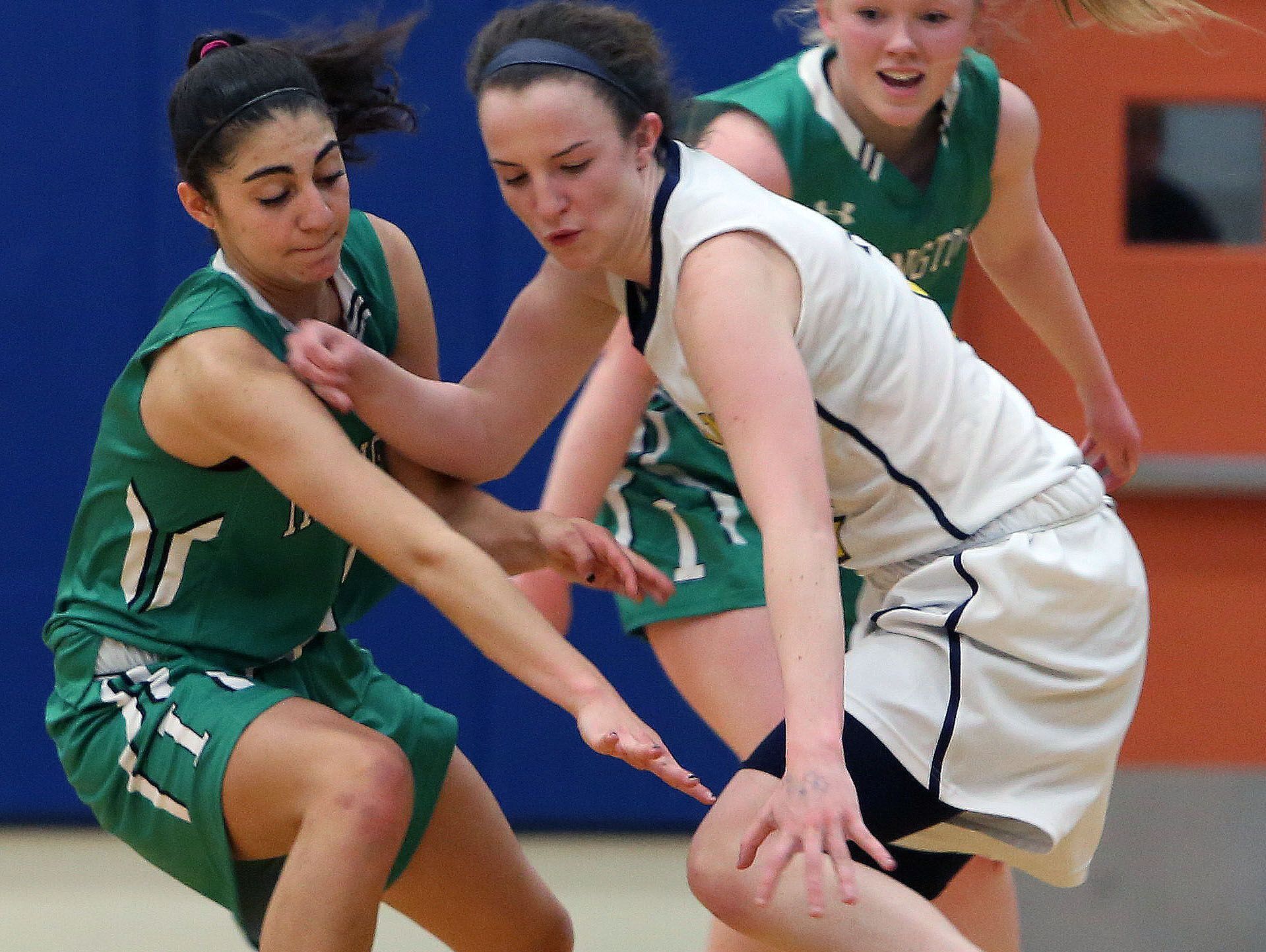 From left, Irvington's Olivia Valdes and Highland's Bri Rozzi battle for a loose ball on Tuesday at SUNY New Paltz.