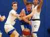From left, Millbrook's Shane Sinon (15) and Humberto Cabrera (3) put pressure on North Salem's Chris Alterio (23) during basketball action during the state regional semifinal at SUNY New Paltz March 7, 2017.
