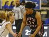 North Central Panthers' Ajanae´ Thomas (34) slips past Carmel Greyhounds' Olivia Christy (2) at Carmel High School on Friday, Dec. 16, 2016. Harris was made the layup and was fouled on the play.