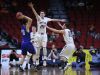 Gladbrook-Reinbeck's Joe Smoldt passes the ball past two North Linn defenders during the state boy's basketball 1A semifinal between North Linn and Gladbrook-Reinbeck on Thursday, March 9, 2017, in Wells Fargo Arena.