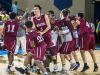 Caravel players celebrate following their 48-47 win over St. Thomas More Academy in the DIAA Boy's State Basketball Tournament semi-finals at the Bob Carpenter Center in Newark on Thursday evening.