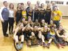 The Mercy girls basketball team celebrates after winning the Class A regional at North Farmington.