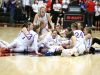 La Salle players celebrate their 42-28 victory over Silverton in the OSAA Class 5A state championship on Friday, March 10, 2017, at Gill Coliseum in Corvallis.