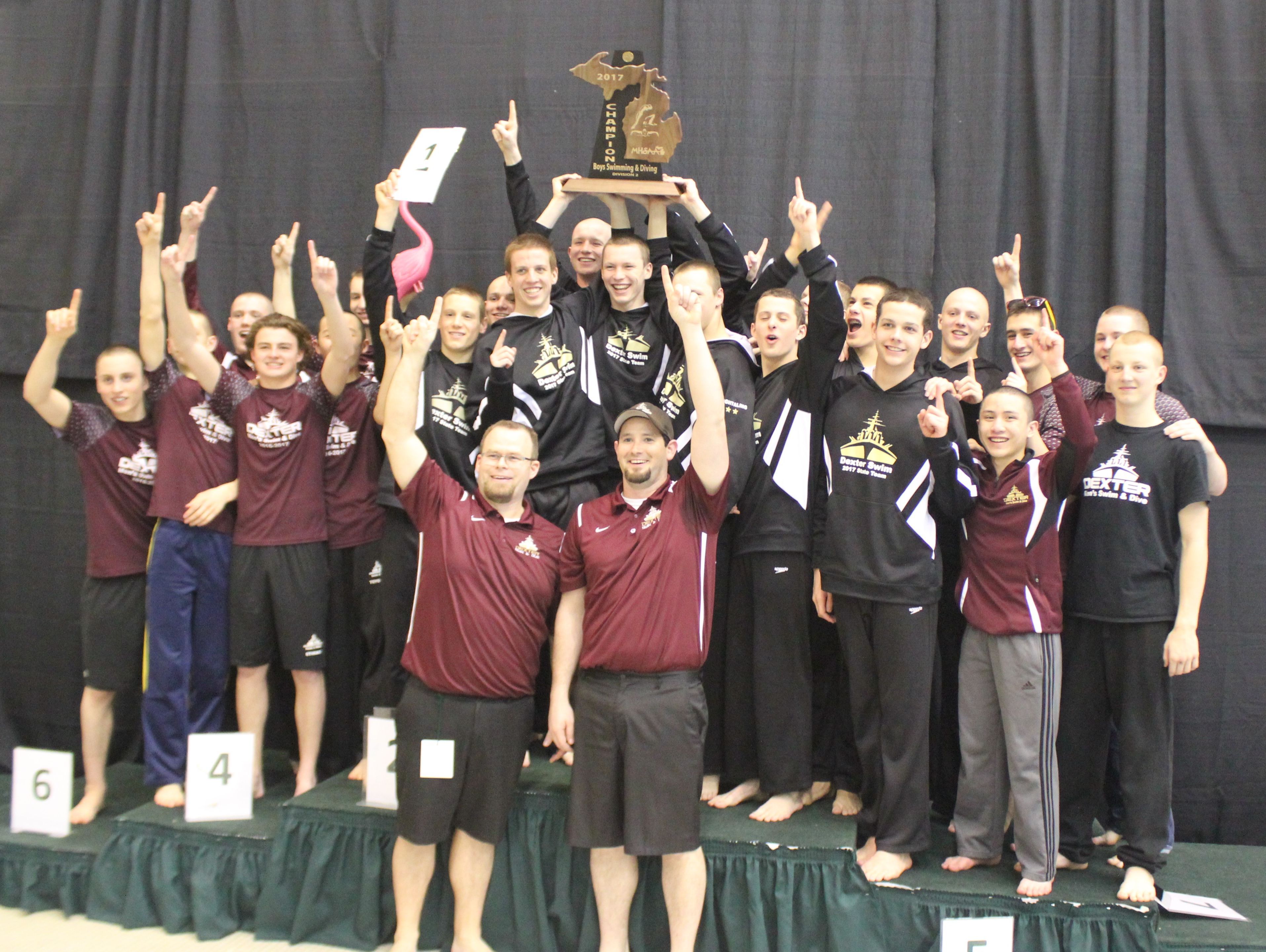 Dexter celebrates after winning its second straight Division 2 state swimming and diving championship at Eastern Michigan on Saturday, March 11, 2017.