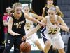 P-W's Emily Spitzley tries to take the ball away from Allie Bonzelet of Maple City Glen Lake Thursday, March 16, 2017, during the Class B Semifinal at the Breslin in East Lansing. P-W won 64-51.