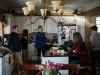 The Kell-Spehn family and friends are seen talking in the kitchen before preparing for a birthday party at their home on Saturday March 11, 2017 in Rochester, MI.