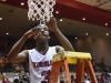 Tindley's Hunter White cuts down part of the net after beating New Washington Saturday, March 18, 2017 for the Class A basketball semi-state championship in the Tiernan Center at Richmond.