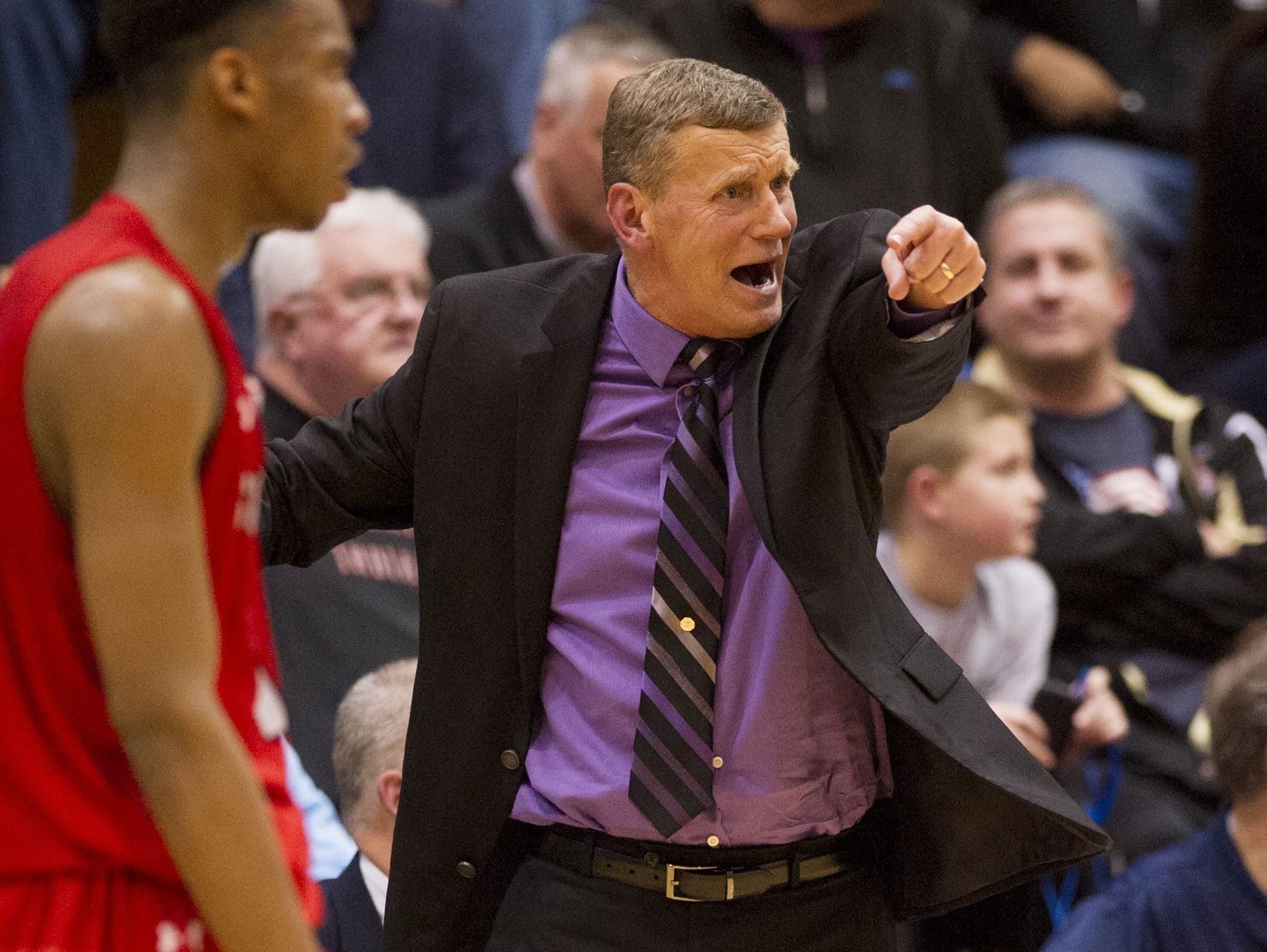 Ben Davis High School head coach Mark James reacts to the action on the court during the second half of action. Perry Meridian High School hosted a IHSAA Boy's Basketball 4A Sectional semi-final game, Friday, March 6, 2015. Southport won 45-27.