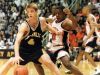 Noblesvilleàs Tom Coverdale (4) makes a move to the basket against Gary Westsideàs Steve Robinson on his way to a 44-point game which his team won 92-78 in IHSAA Semi-State basketball Saturday, March 15, 1997, in West Lafayette, Ind.
