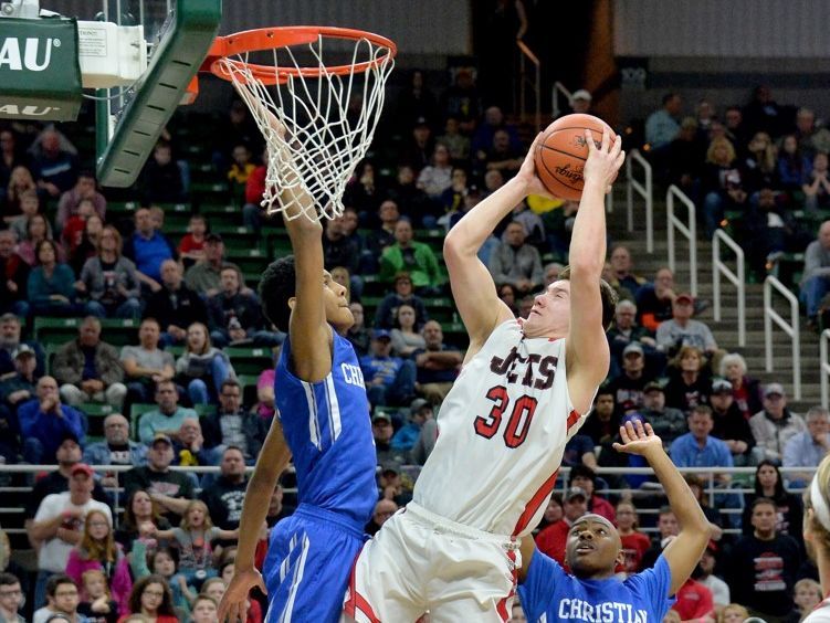 Powers North Central senior and Mr. Basketball finalist Jason Whitens goes up for a shot against Southfield Christian in Thursday's Class D semifinal at the Breslin Center. North Central won, 84-83, in double overtime.