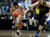 Lansing Christian's Forrest Bouyer drives the ball down the court during the Class D state semifinals against Buckley on Thursday, March 23, 2017 at the Breslin Center in East Lansing. Buckley won, 68-61.