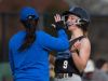 Charter sophomore Taylor Gillis is congratulated by Eileen Voltz after a triple against Conrad. Gillis went 3-5 with a home run in a 9-0 win at Conrad Friday.